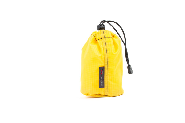 A Size 1 Marigold (yellow with light yellow grid) 210 Cerylon Travel Stuff Sack.